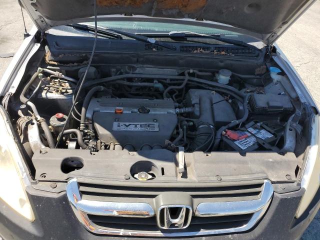 Photo 12 from auction – 2002 HONDA CR-V LX with VIN JHLRD684X2C005121