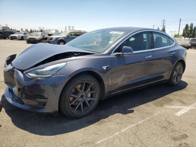 TESLA MODEL 3 2018 with VIN 5YJ3E1EA5JF102077 - Photo from auction