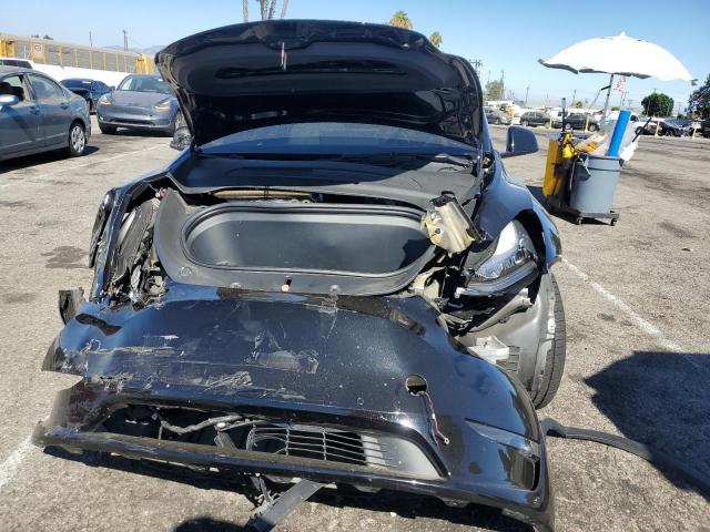 Photo 5 from auction – 2021 TESLA MODEL Y with VIN 5YJYGDED3MF181314