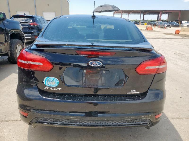 Photo 6 from auction – 2016 FORD FOCUS SE with VIN 1FADP3F23GL324436