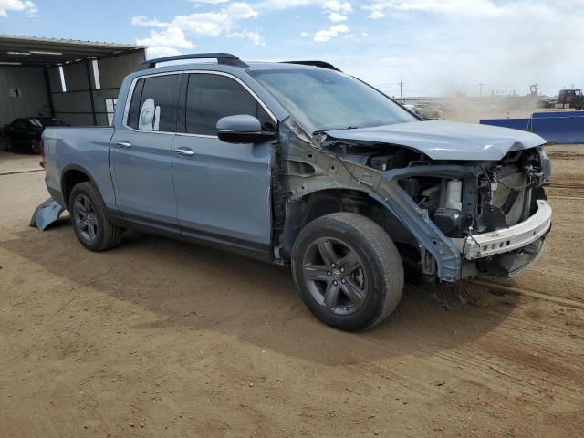 Photo 4 from auction – 2022 HONDA RIDGELINE with VIN 5FPYK3F73NB019208