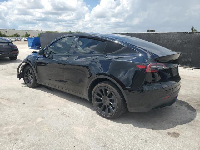 Photo 2 from auction – 2023 TESLA MODEL Y with VIN 7SAYGDEE7PF750200
