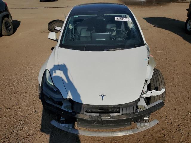 Photo 5 from auction – 2022 TESLA MODEL 3 with VIN 5YJ3E1EB1NF278039