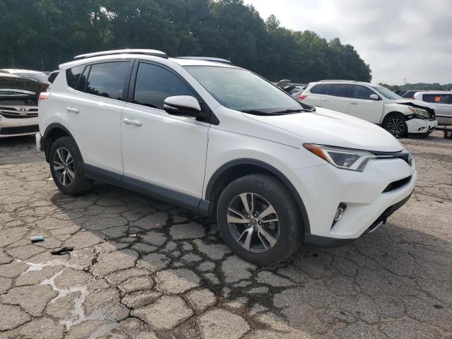 Photo 4 from auction – 2016 TOYOTA RAV4 XLE with VIN JTMWFREV3GJ069917