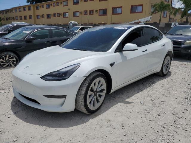 TESLA MODEL 3 2022 with VIN 5YJ3E1EA9NF299504 - Photo from auction