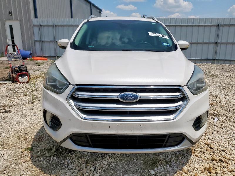 Photo 5 from auction – 2017 FORD ESCAPE TIT with VIN 1FMCU0J99HUC65871