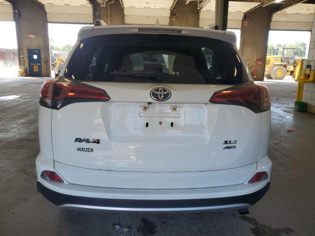 Photo 6 from auction – 2016 TOYOTA RAV4 XLE with VIN JTMRFREV0GJ091614