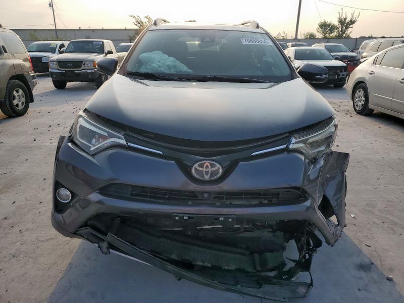 Photo 5 from auction – 2018 TOYOTA RAV4 LIMIT with VIN 2T3YFREV7JW444192