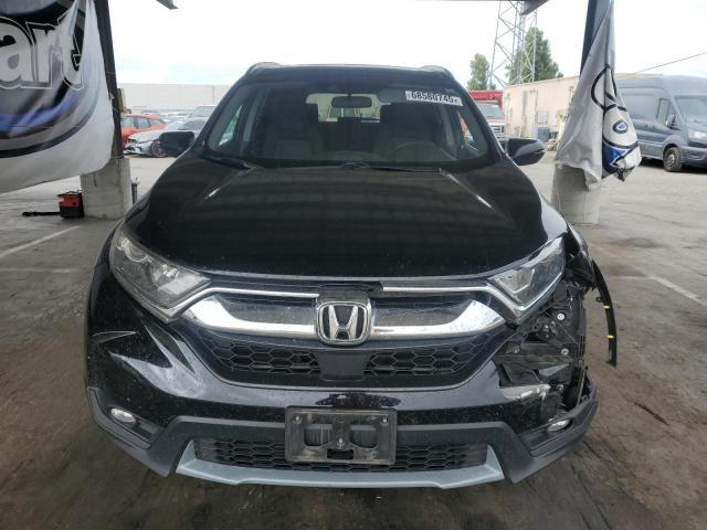 Photo 5 from auction – 2018 HONDA CR-V EX with VIN 7FARW2H56JE039796