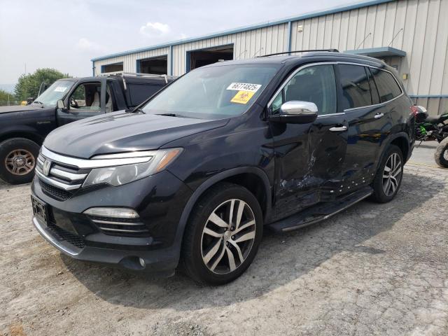 HONDA PILOT TOUR 2016 with VIN 5FNYF6H92GB060946 - Photo from auction