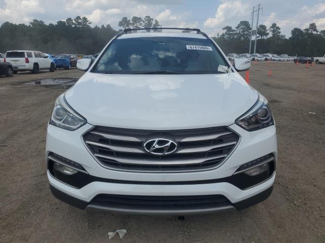 Photo 5 from auction – 2017 HYUNDAI SANTA FE S with VIN 5NMZU4LA6HH044667