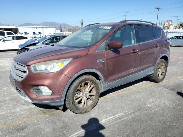 FORD ESCAPE 2018 with VIN 1FMCU0HD6JUA85828 - Photo from auction