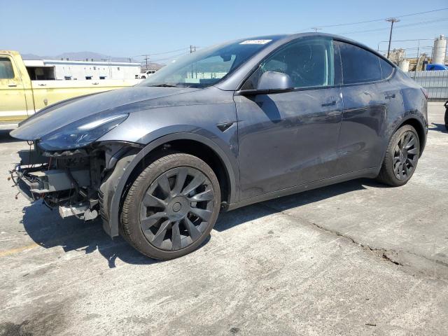 TESLA MODEL Y 2023 with VIN 7SAYGDED2PF962946 - Photo from auction