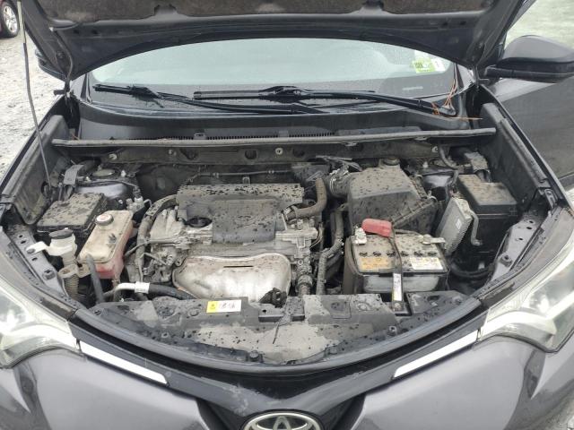 Photo 12 from auction – 2018 TOYOTA RAV4 LE with VIN JTMBFREV5JJ720535