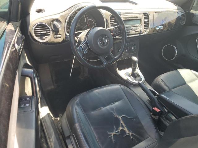 Photo 8 from auction – 2014 VOLKSWAGEN BEETLE with VIN 3VW507AT4EM819649
