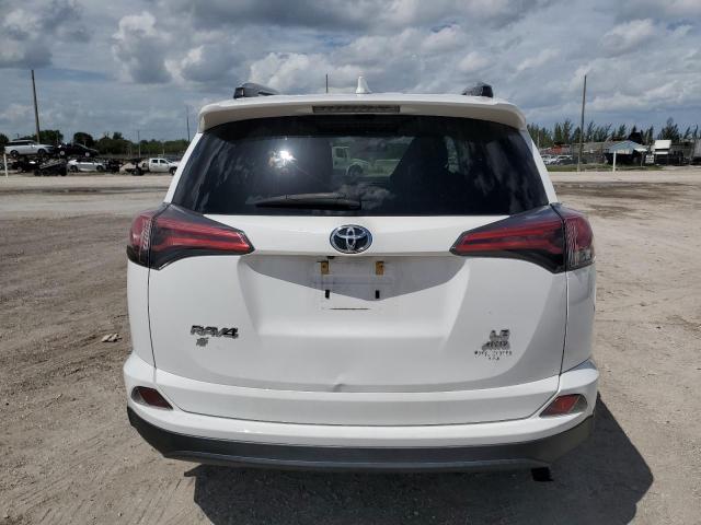 Photo 6 from auction – 2018 TOYOTA RAV4 LE with VIN 2T3BFREV6JW770975