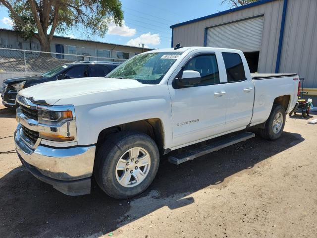 CHEVROLET SILVERADO 2018 with VIN 1GCVKREC0JZ305941 - Photo from auction