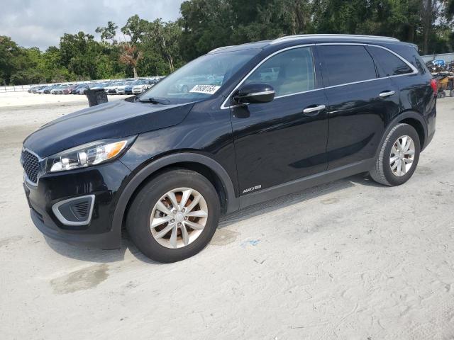 KIA SORENTO LX 2018 with VIN 5XYPGDA56JG430414 - Photo from auction