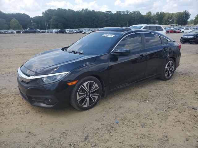 HONDA CIVIC 4D E 2018 with VIN JHMFC1F75JX044112 - Photo from auction