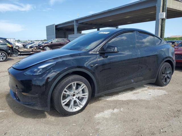 TESLA MODEL Y 2024 with VIN 7SAYGDED4RF015491 - Photo from auction