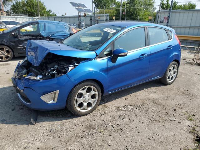 FORD FIESTA SES 2011 with VIN 3FADP4FJ9BM115979 - Photo from auction
