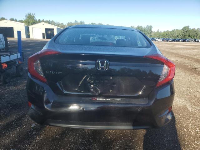 Photo 6 from auction – 2016 HONDA CIVIC LX with VIN 2HGFC2F54GH030741