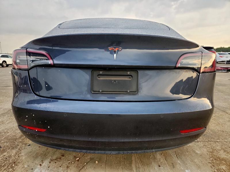 Photo 6 from auction – 2022 TESLA MODEL 3 with VIN 5YJ3E1EAXNF102775