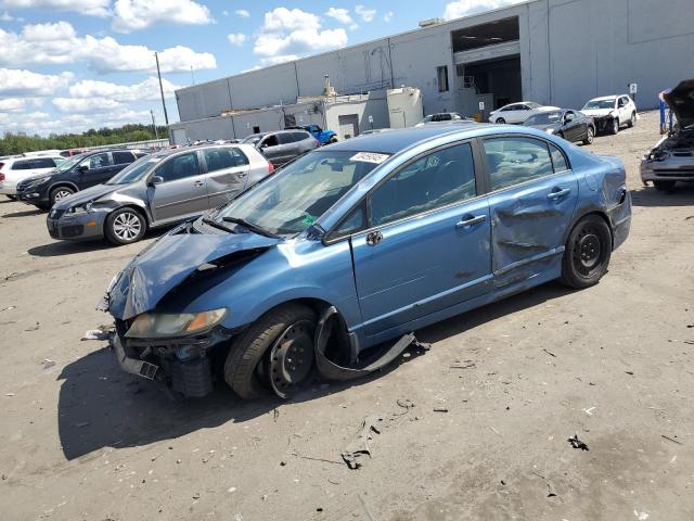 HONDA CIVIC LX 2011 with VIN 19XFA1F56BE031036 - Photo from auction