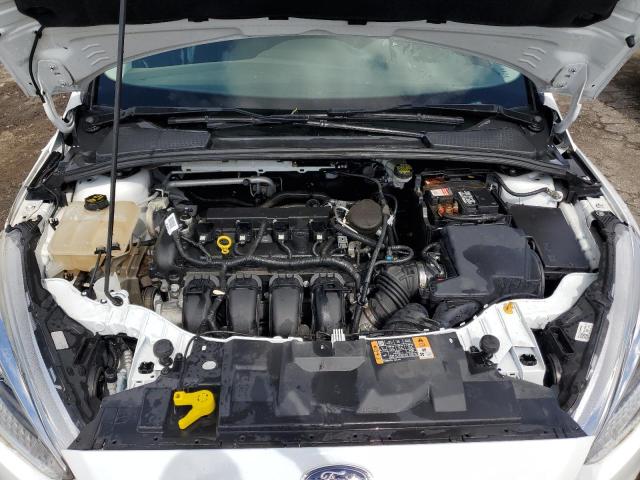 Photo 11 from auction – 2016 FORD FOCUS SE with VIN 1FADP3F25GL229635