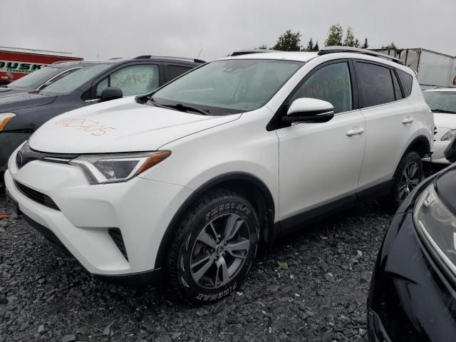 Photo 1 from auction – 2018 TOYOTA RAV4 LE with VIN 2T3BFREVXJW822060
