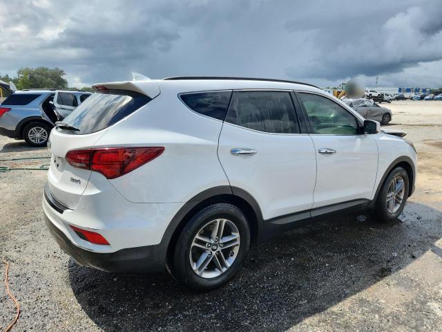 Photo 3 from auction – 2017 HYUNDAI SANTA FE S with VIN 5NMZU3LB9HH015232