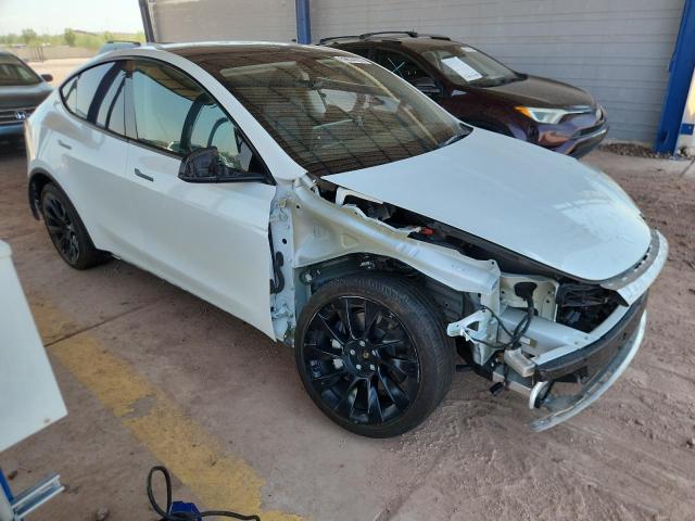 Photo 4 from auction – 2023 TESLA MODEL Y with VIN 7SAYGDEE0PA050659