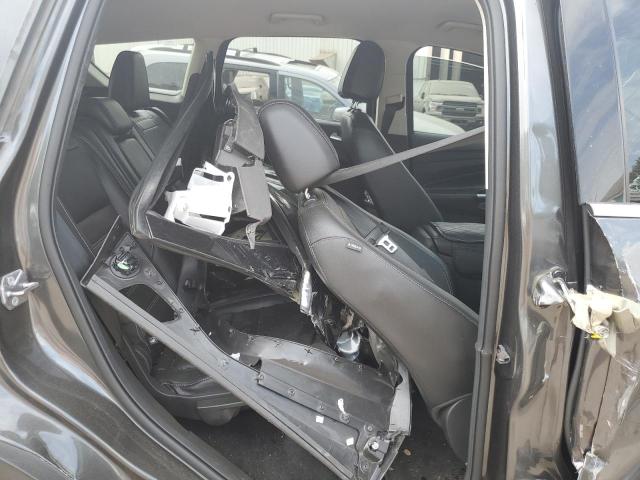 Photo 11 from auction – 2017 FORD ESCAPE TITANIUM with VIN 1FMCU9J94HUD63792