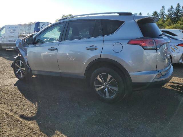 Photo 2 from auction – 2018 TOYOTA RAV4 LE with VIN 2T3ZFREV2JW496267