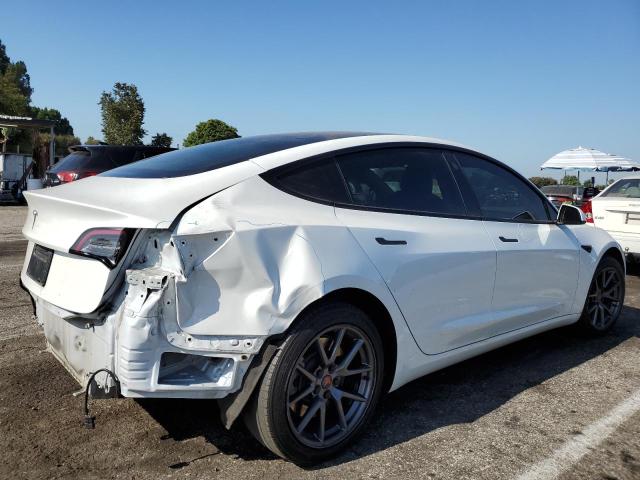 Photo 3 from auction – 2021 TESLA MODEL 3 with VIN 5YJ3E1EA4MF074809
