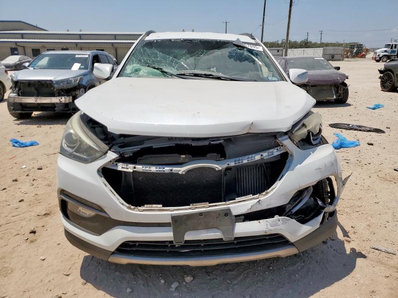 Photo 5 from auction – 2018 HYUNDAI SANTA FE S with VIN 5NMZU4LA6JH075536