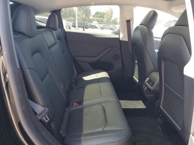 Photo 11 from auction – 2023 TESLA MODEL Y with VIN 7SAYGDEE2PA125832