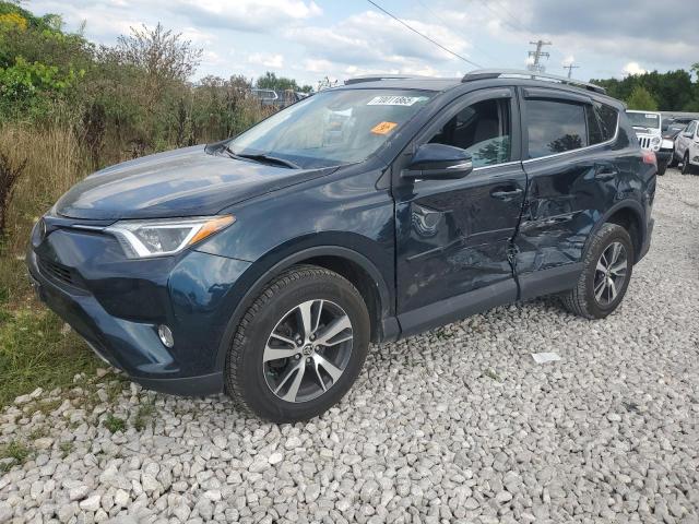 TOYOTA RAV4 XLE 2017 with VIN 2T3RFREV0HW661565 - Photo from auction