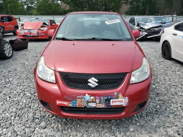 Photo 5 from auction – 2012 SUZUKI SX4 LE with VIN JS2YC5A32C6301179