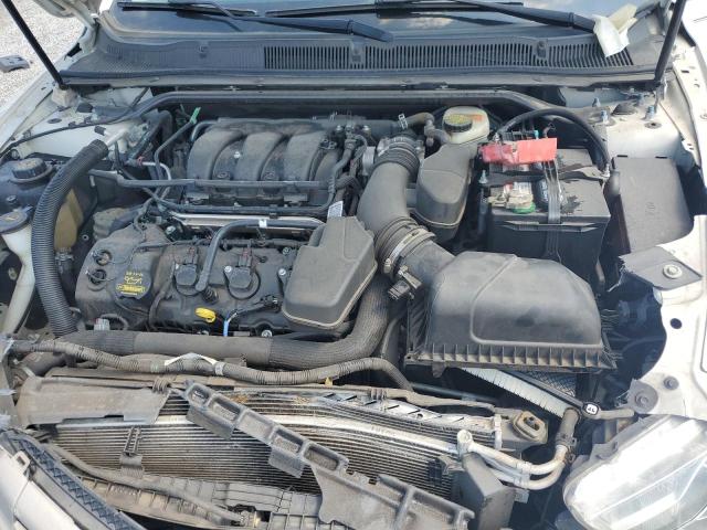 Photo 11 from auction – 2014 FORD TAURUS SEL with VIN 1FAHP2E83EG128536