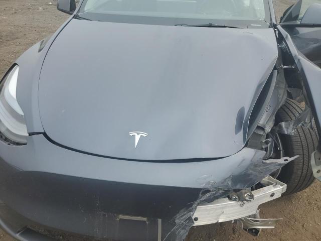 Photo 12 from auction – 2023 TESLA MODEL Y with VIN 7SAYGDEE2PA180779