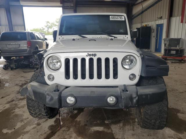 Photo 5 from auction – 2016 JEEP WRANGLER U with VIN 1C4BJWDG2GL136218