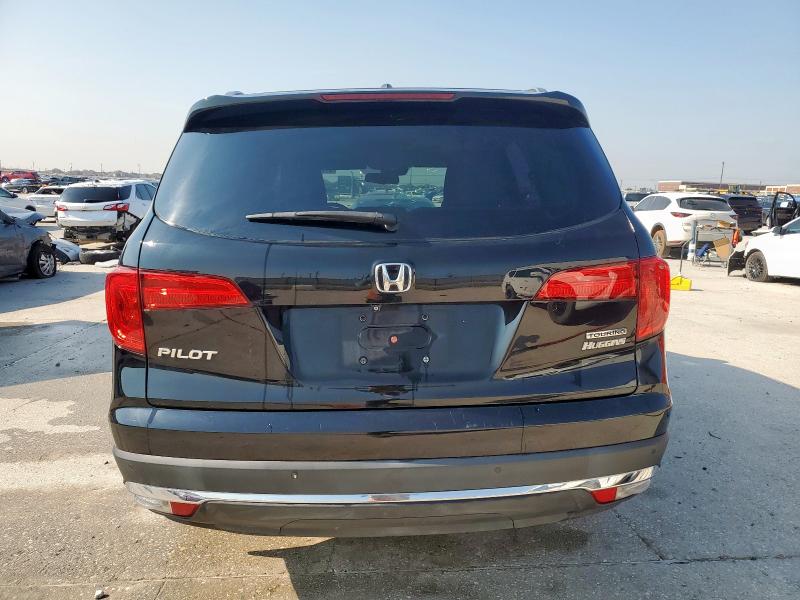 Photo 6 from auction – 2017 HONDA PILOT TOUR with VIN 5FNYF5H98HB044150