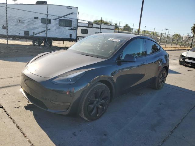 TESLA MODEL Y 2024 with VIN 7SAYGDED4RF123352 - Photo from auction