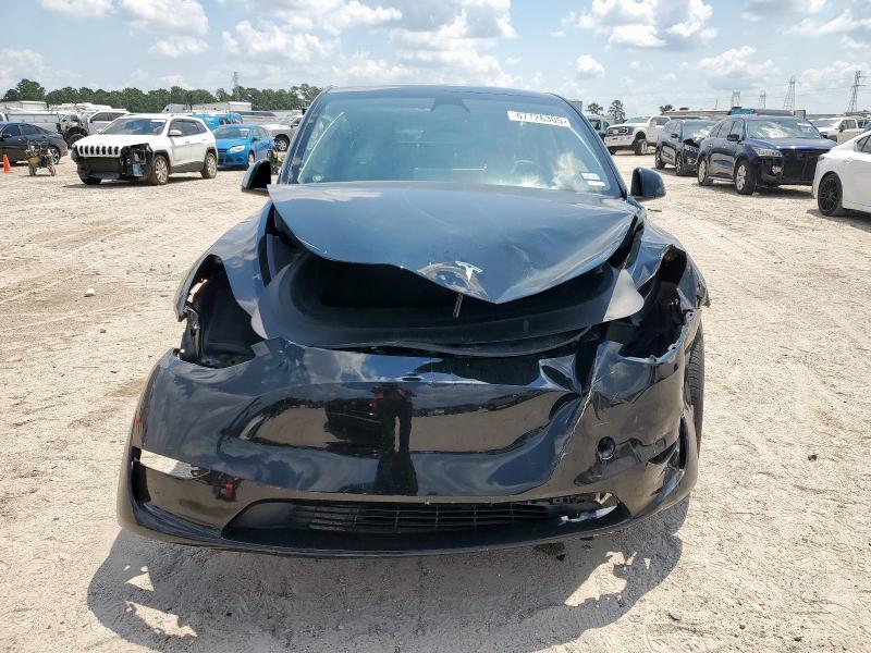 Photo 5 from auction – 2023 TESLA MODEL Y with VIN 7SAYGDEE7PA063506
