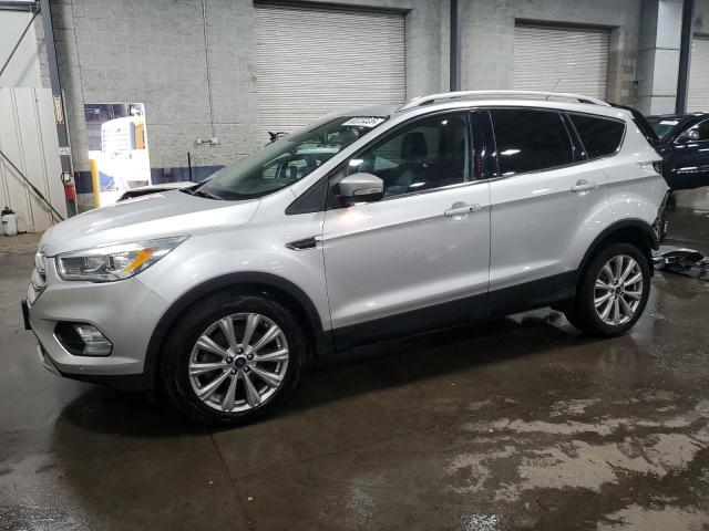 FORD ESCAPE TIT 2017 with VIN 1FMCU0J93HUD28852 - Photo from auction