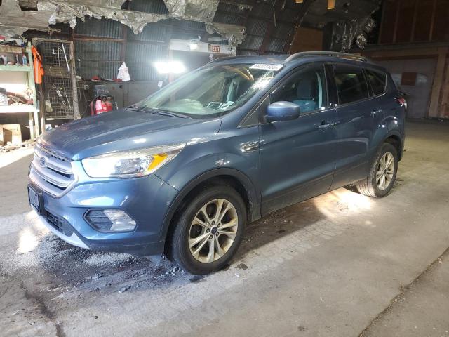 FORD ESCAPE SE 2018 with VIN 1FMCU9GD2JUB19012 - Photo from auction