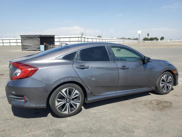Photo 3 from auction – 2018 HONDA CIVIC EX with VIN JHMFC1F38JX041864