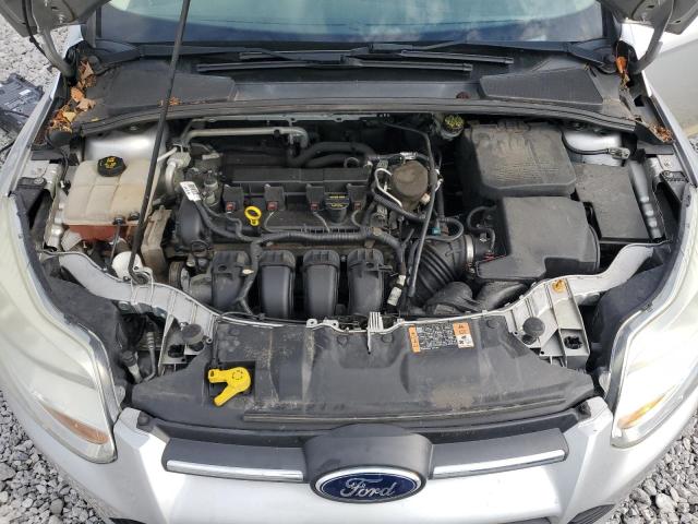 Photo 11 from auction – 2014 FORD FOCUS S with VIN 1FADP3E27EL388963