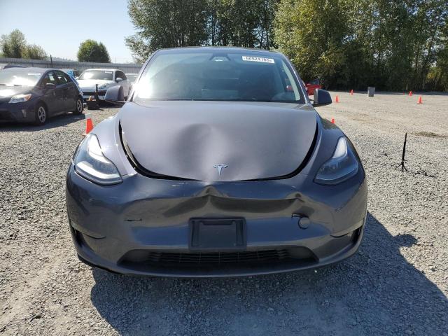 Photo 5 from auction – 2023 TESLA MODEL Y with VIN 7SAYGDEE0PF802640